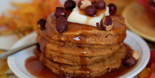 Pumpkin Pancakes with Buttermilk Caramel Syrup and Toasted Hazelnuts