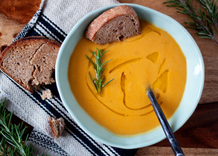Creamy Sweet Potato Rosemary Soup recipe - Fresh rosemary and creamy sweet potatoes unite happily in this super-simple (yet super-scrumptious) soup. (Vegetarian with vegan option)