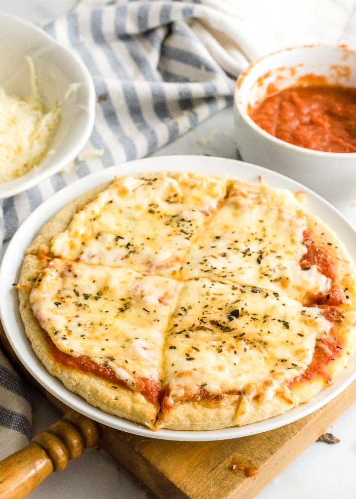 A cheese pizza with homemade pizza sauce