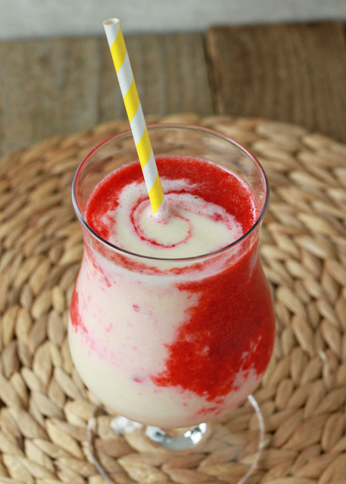 Inspired by its strawberry pina colada cocktail cousin, this vegan Lava Flow Smoothie is sure to whisk you away to somewhere tropical - at least, in your mind.