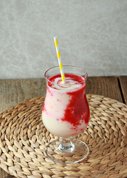 Inspired by its strawberry pina colada cocktail cousin, this vegan Lava Flow Smoothie is sure to whisk you away to somewhere tropical - at least, in your mind.