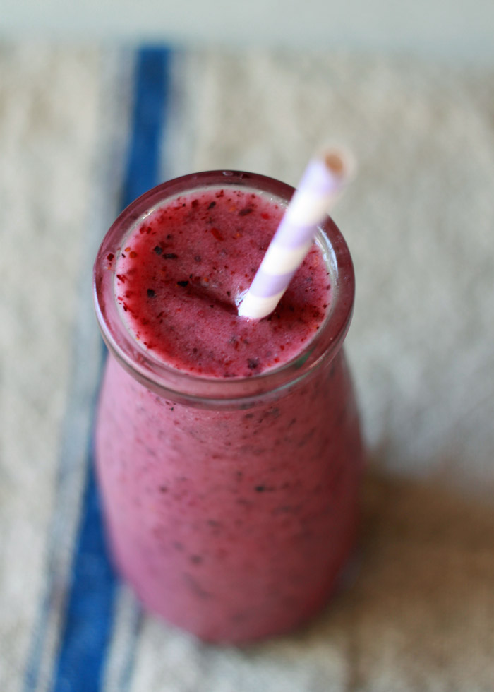 Power Berry Smoothie recipe - Blueberries, cranberries, and pomegranate juice combine forces in this zippy vegan smoothie that's sure to give you a little extra pep in your step.