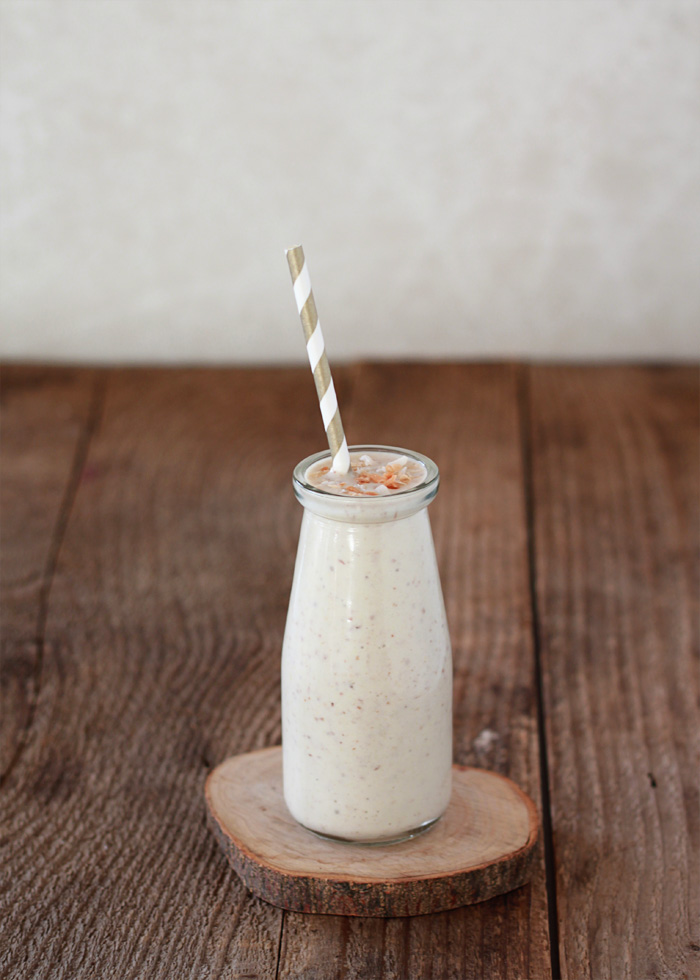 Treat yourself to this rich and creamy #vegan toasted coconut smoothie from kitchentreaty.com. Bonus: a full serving of heart-healthy flaxseed is in there, too!