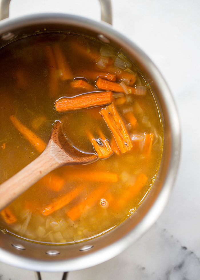 Roasted carrots in broth for roasted carrot ginger soup