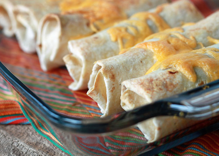 Easy Refried Bean and Cheese Burritos with Optional Chicken (perfect for freezing!) | kitchentreaty.com