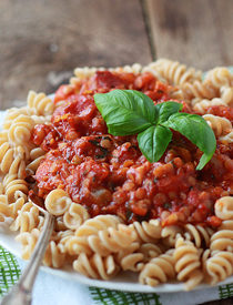 Red lentil pasta sauce over rotina pasta