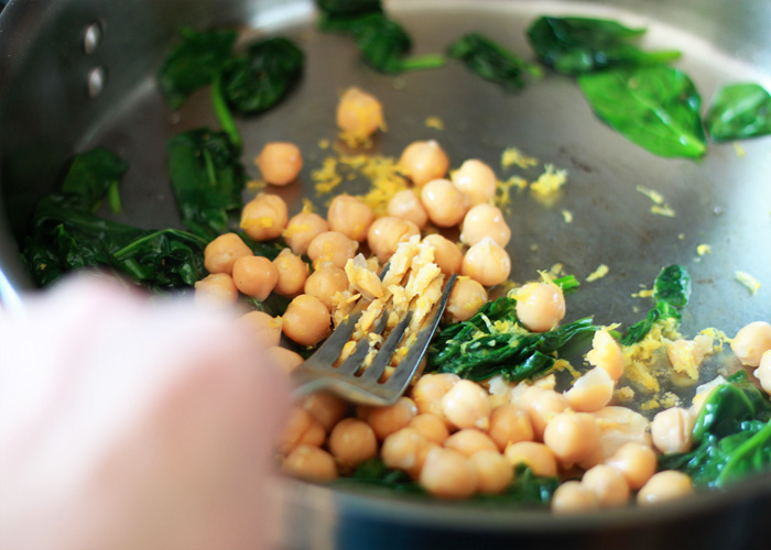Lemony Egg in a Spinach-Chickpea Nest - Five minutes to a satisfying, wholesome, protein-rich breakfast! Sunny lemon brightens up breakfast with this super-simple egg-in-a-nest for one.