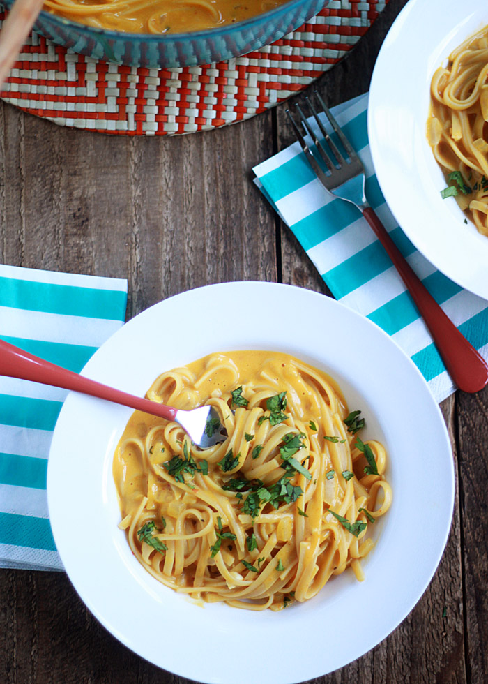 One Pot Creamy Pumpkin Pasta - Luxuriously creamy pumpkin pasta in 20 minutes! It's possible with this super-simple vegetarian one-pot pasta recipe.