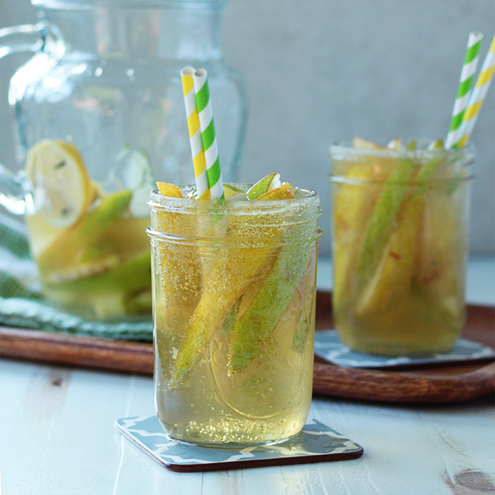 Ginger Pear White Sangria - Sweet Autumn pears and zippy ginger join up in this spiced sangria that couldn't be more perfect for the season.