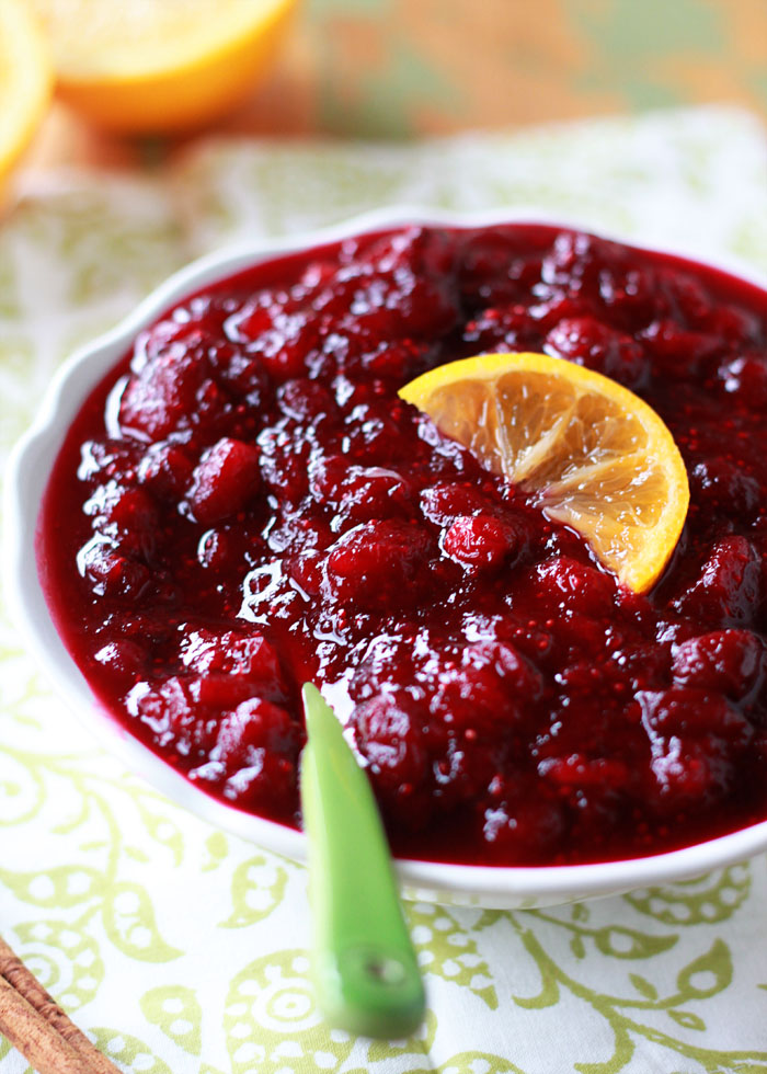 Orange Maple Cranberry Sauce - This easy homemade cranberry sauce recipe is sweetened with pure maple syrup instead of refined sugar. Orange and cinnamon lend subtle seasonal flavor without taking over. Make now and freeze for Thanksgiving!