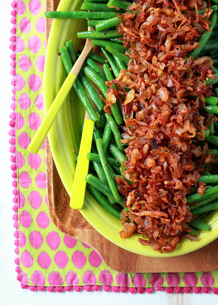 Sauteed Green Beans with Smoky Shallots - Tender green beans topped with smoky sauteed shallots instead of bacon. This vegetarian (and vegan!) side is a welcome addition to the holiday table.