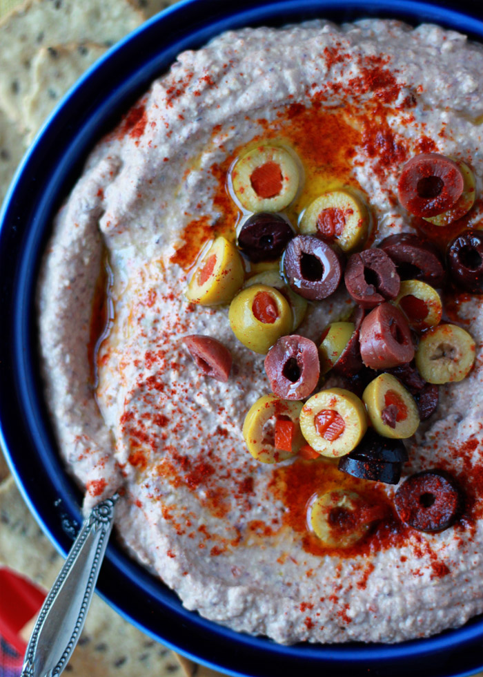 Salty kalamatas and pimento-stuffed green olives lend a little pizzazz to plain ol' hummus.