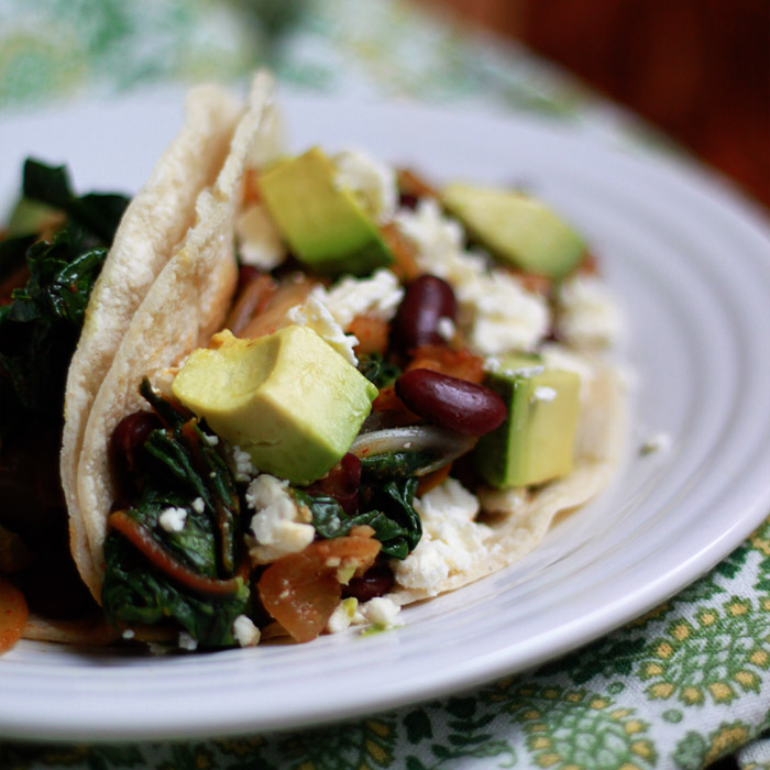 Beans and Greens Tacos recipe - Made with kidney beans and rainbow chard, these hearty tacos are pretty much the perfect weeknight meal.
