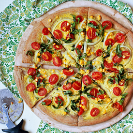 Vegan Summer Pizza with Sweet Corn, Tomatoes, and Basil - Pizza without cheese? Believe it or not, it can be utterly delicious! This seasonal summertime pizza is proof.