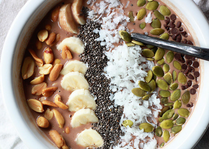Wanna feel like you're getting to eat ice cream for breakfast? Make this Chocolate Peanut Butter Smoothie Bowl! It's refreshing, surprisingly hearty, and pretty dang healthy, too. 
