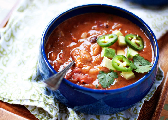 Jalapeno Black Bean and White Bean Soup - This super-simple recipe is healthy, comes together in a cinch, and is so wonderfully full-flavored. We love it! This recipe starts out vegan, but you can customize the toppings to add dairy or even a little meat if the carnivores like.