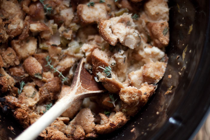 Slow Cooker Sourdough Herb Stuffing recipe - This simple Crock Pot stuffing recipe stays moist in the middle and gets golden-crisp around the edges. Holiday perfection - plus, it's vegetarian and dairy-free!