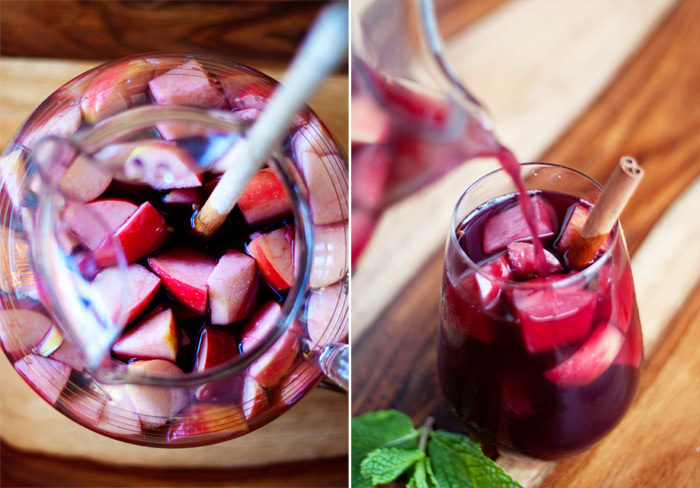 Juicy Red Apple Sangria recipe - A lush red sangria with apples, spices, brandy, and more. We love this sangria for the holidays.