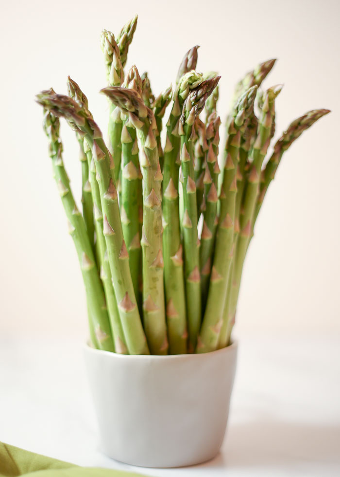 Three ways to prepare delicious asparagus! Step-by-step instructions with photos for prepping and roasting in the oven, blanching on the stove, or on the grill!