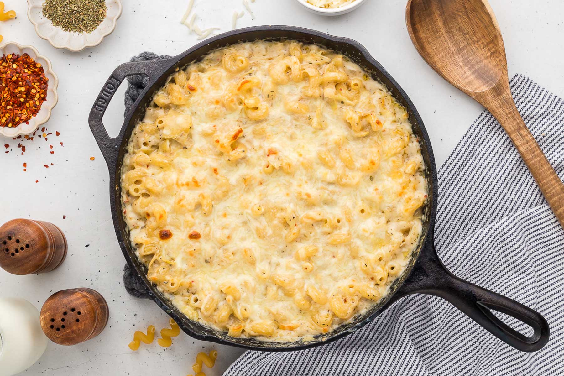 top view of artichoke pasta bake in a skillet