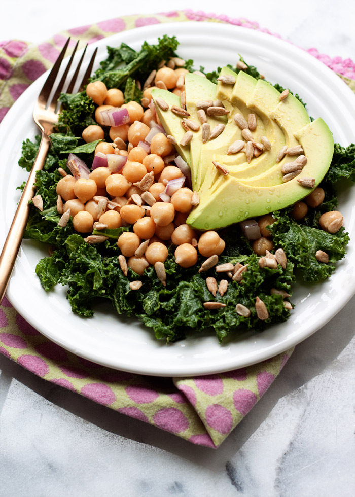 Massaged Kale Salad with Avocado & Chickpeas recipe - The 10-minute vegan meal I can't stop making: Kale massaged with avocado then topped with a simple chickpea salad and more avocado. (More avocado is always a good thing, am I right?)