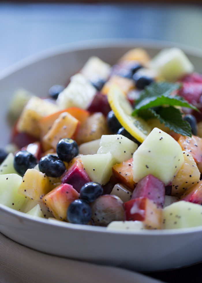 Summer Fruit Salad with Lemon Poppyseed Yogurt Dressing - This fresh and easy fruit salad features juicy summer fruits and a zingy, creamy, dairy-free yogurt dressing.