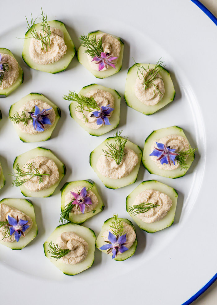 Cucumber Slices with Smoky Sunflower Seed Pate - A fresh, healthy, make-ahead appetizer made with a creamy sunflower seed and fresh dill pate. Garnish how you like depending on the season. Vegan & gluten-free. 
