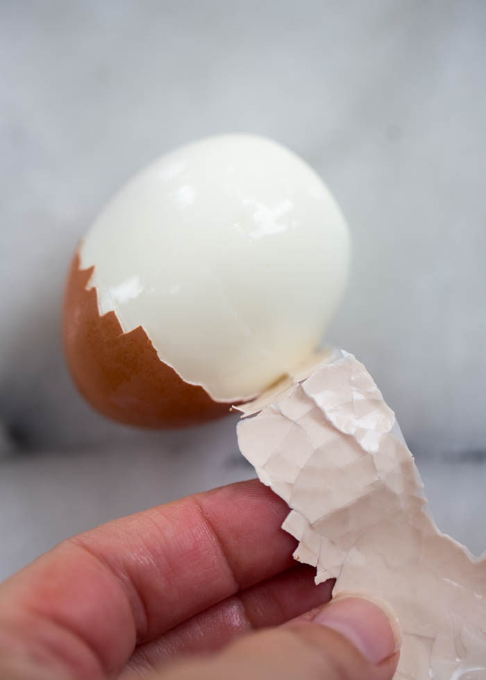 Peeling an Instant-Pot-cooked hard-boiled egg - the peel practically falls off!