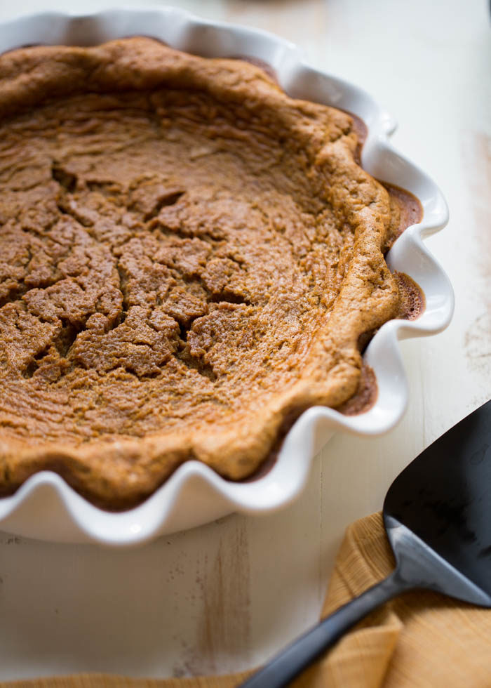 The easiest pumpkin pie you'll ever make! Crustless and delicious. With gluten-free option. Just dump into the blender, pour into your pie pan, and bake. #impossiblepumpkinpie #dairyfreepumpkinpie #pumpkinpiewithcoconutmilk #dairyfreethanksgiving
