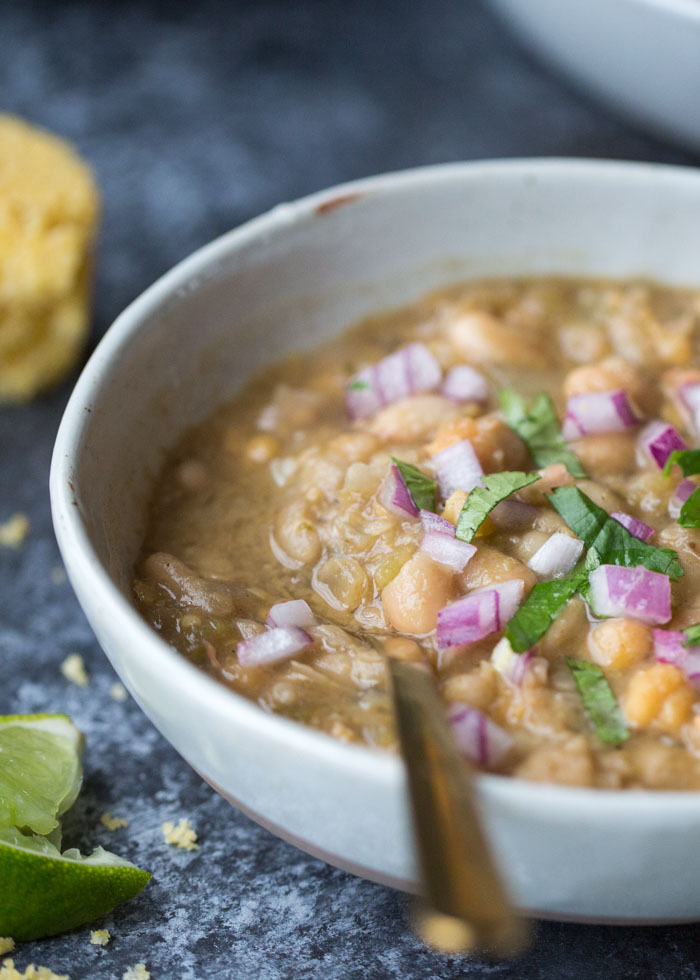 20-Minute Vegetarian White Bean Chili - I'm always surprised by how complex this tastes considering it only takes 20 minutes! Three kinds of beans add interest to this simple (and fast) vegetarian/vegan white bean chili recipe. A weeknight go-to around here! #whitebeanchili