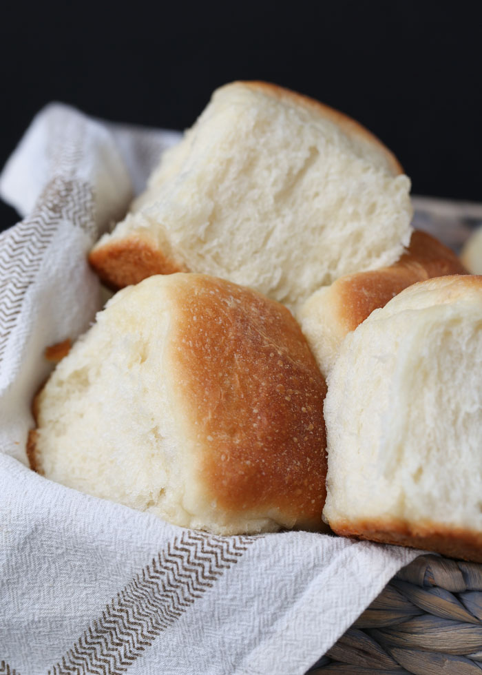 Soft & Fluffy Vegan Dinner Rolls - Please the vegans without disappointing the carnivores. These soft, fluffy, buttery, and melt-in-your-mouth dinner rolls are total crowd-pleasers - no eggs or dairy needed.