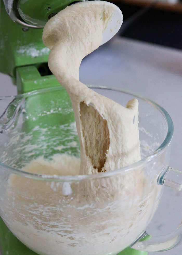 Dinner roll dough in a stand mixer bowl