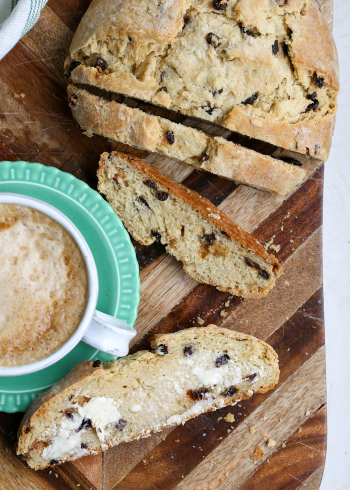 Vegan Irish Soda Bread - Golden-brown deliciousness that tastes just like the original. Just because you're vegan or dairy-free doesn't mean you can't enjoy a little bread-o-the-Irish! 