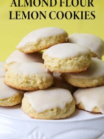 A plate of almond flour lemon cookies with a yellow background. The text reads, "almond flour lemon cookies."