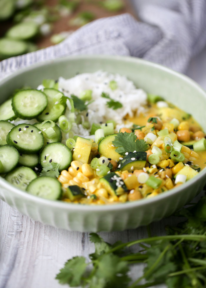 This summery curry is quite possibly my favorite, no matter the season! Chickpeas, zucchini, and corn swimming in a warmly spiced, creamy sauce. The cool, crunchy Persian cucumber garnish is a welcome counterpoint.
