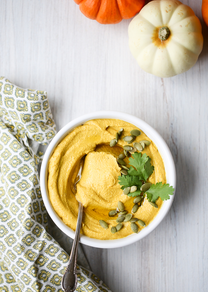 Curried Pumpkin Hummus - Harvest hummus to the fall potluck rescue! This easy app is perfect to bring along to parties, or just keep a batch in the fridge to enjoy for yourself. 