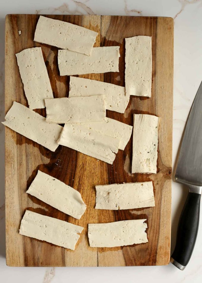 This Tofu Bacon recipe might just be my favorite plant-based protein hack of all time. No marinating needed. No baking needed. Plus, we're talking only five ingredients - and that's if you include the cooking oil. 