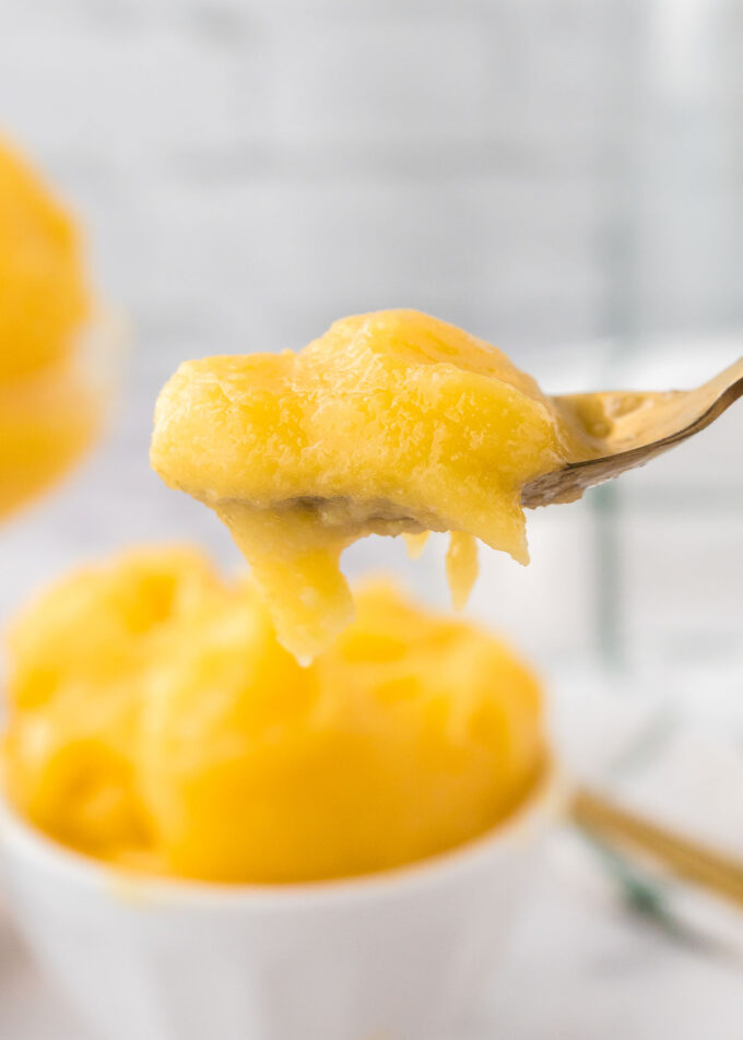 A spoonful of mango sorbet