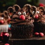 reindeer cupcake on a wooden board