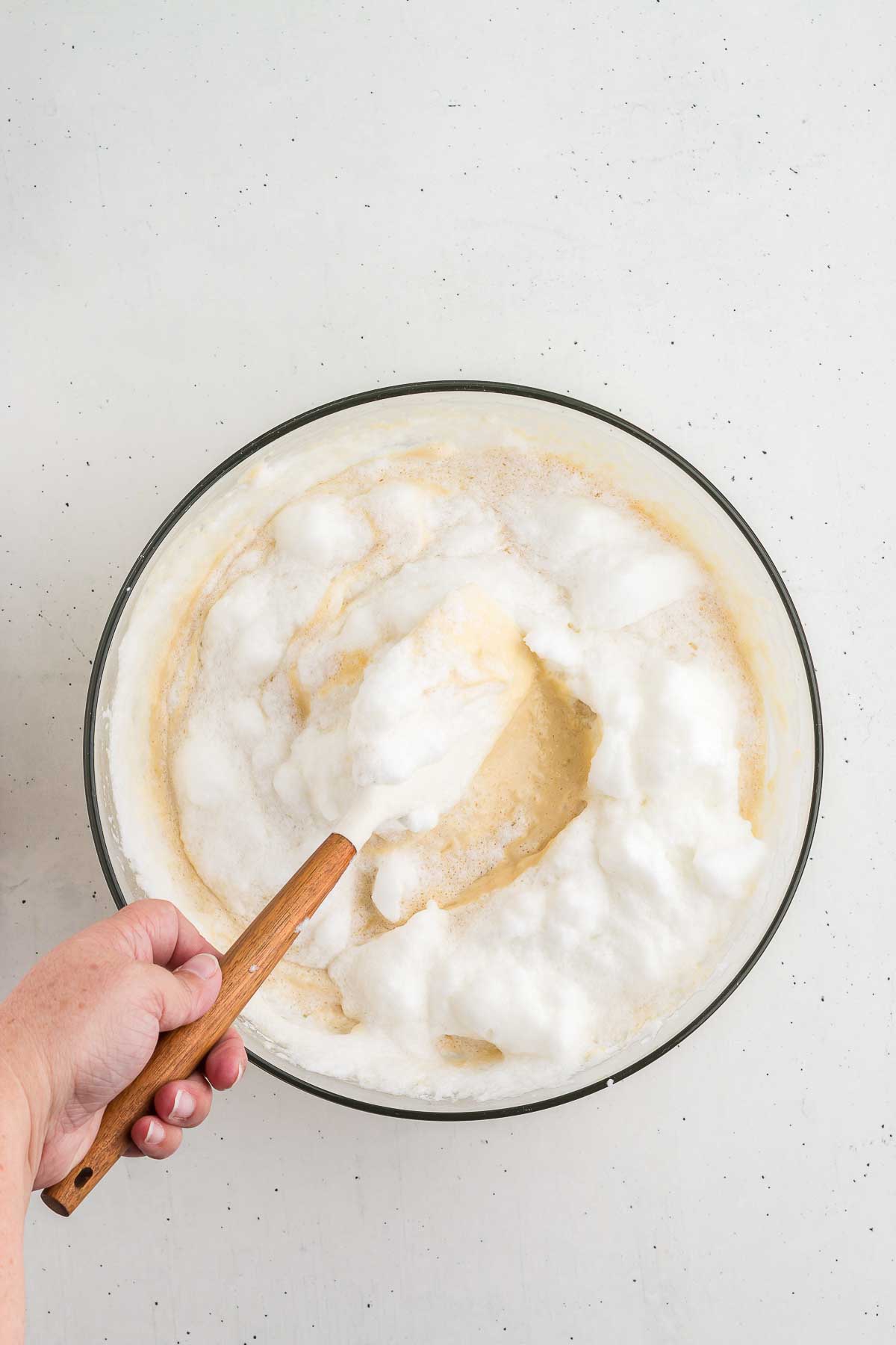 folding egg whites into batter for waffles