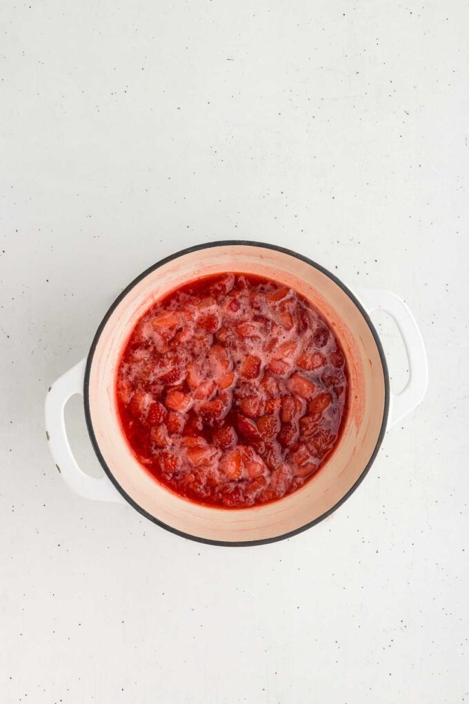 strawberry sauce simmering until thick
