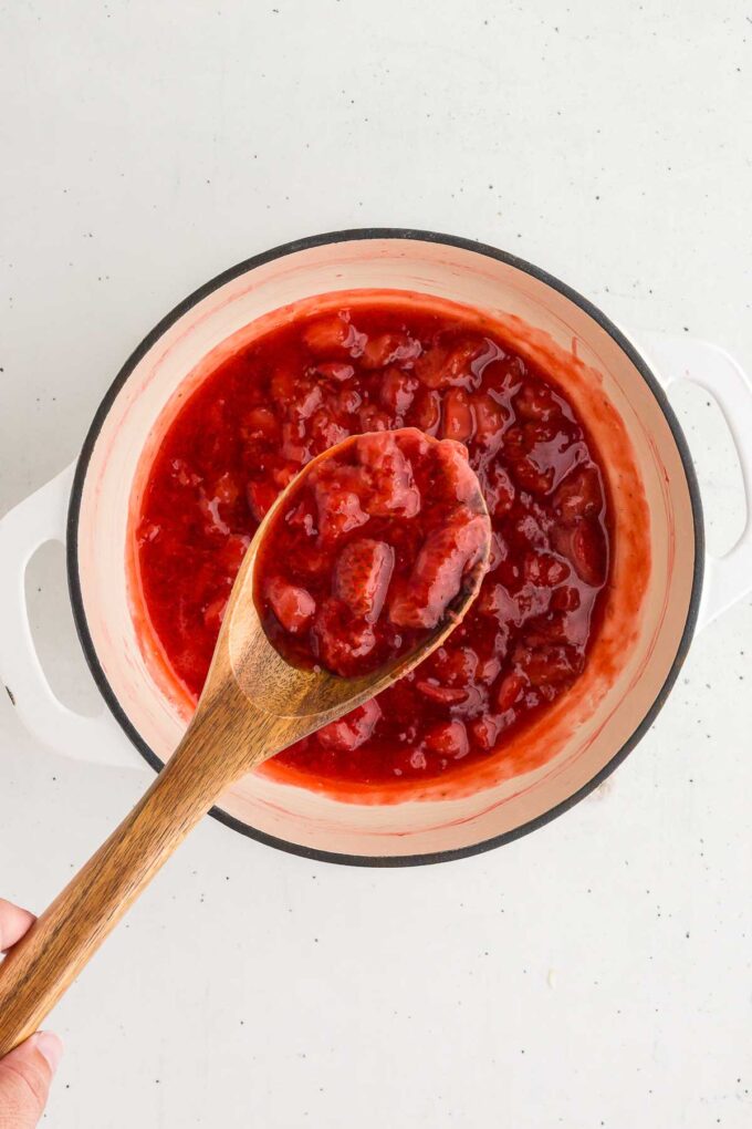 thickened cooked strawberry sauce ready to serve.