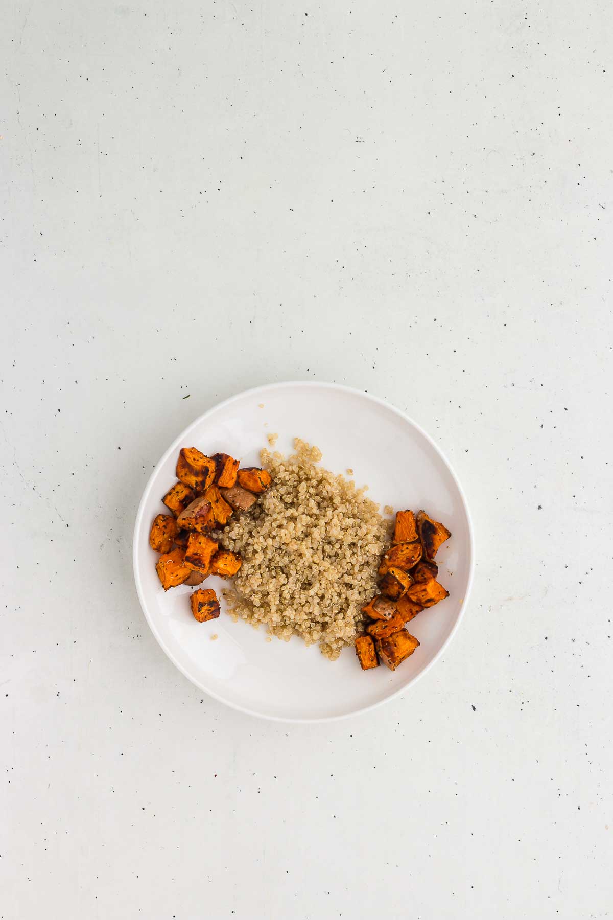 Add sweet potatoes to grain bowl