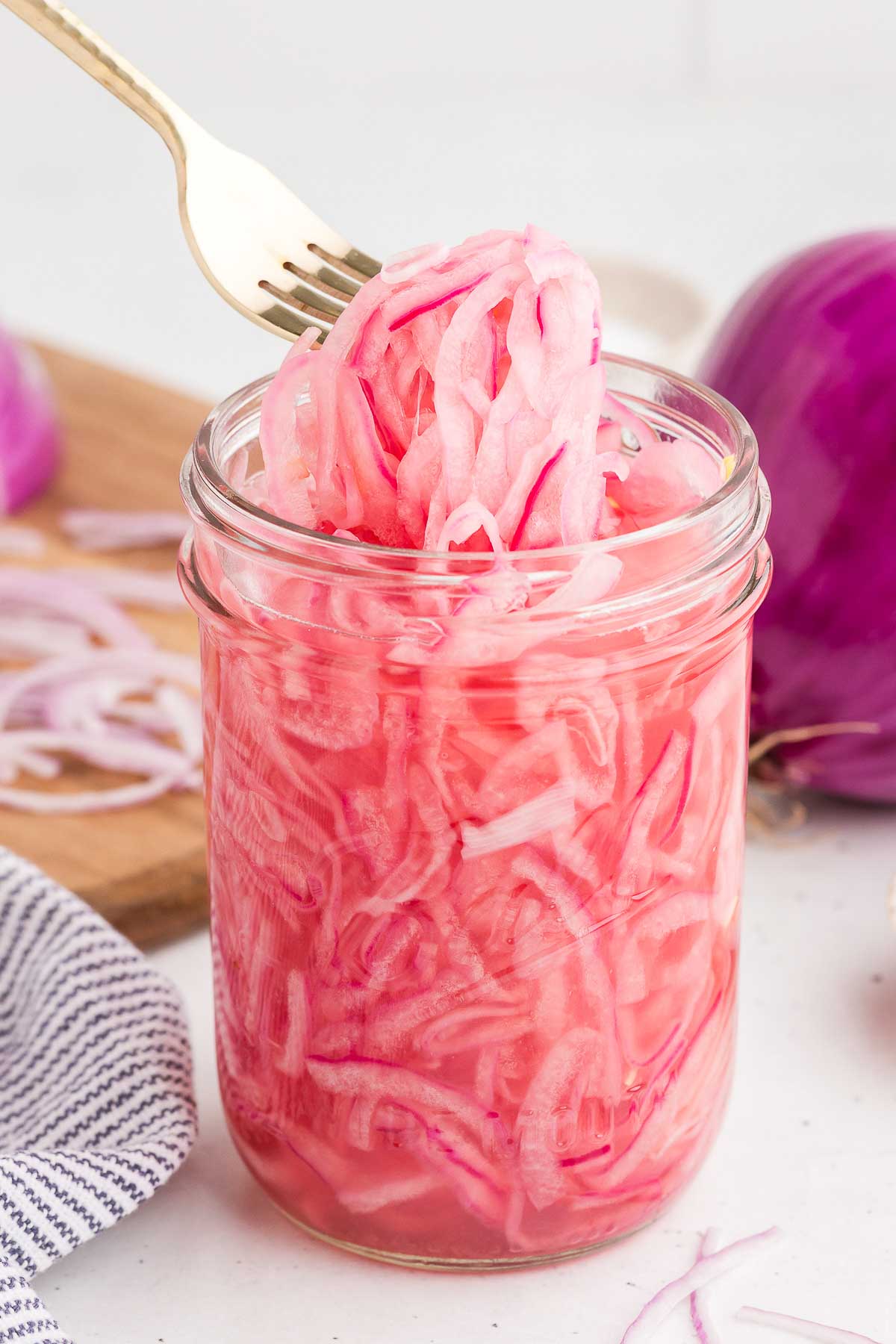 quick-pickled red onions in a jar