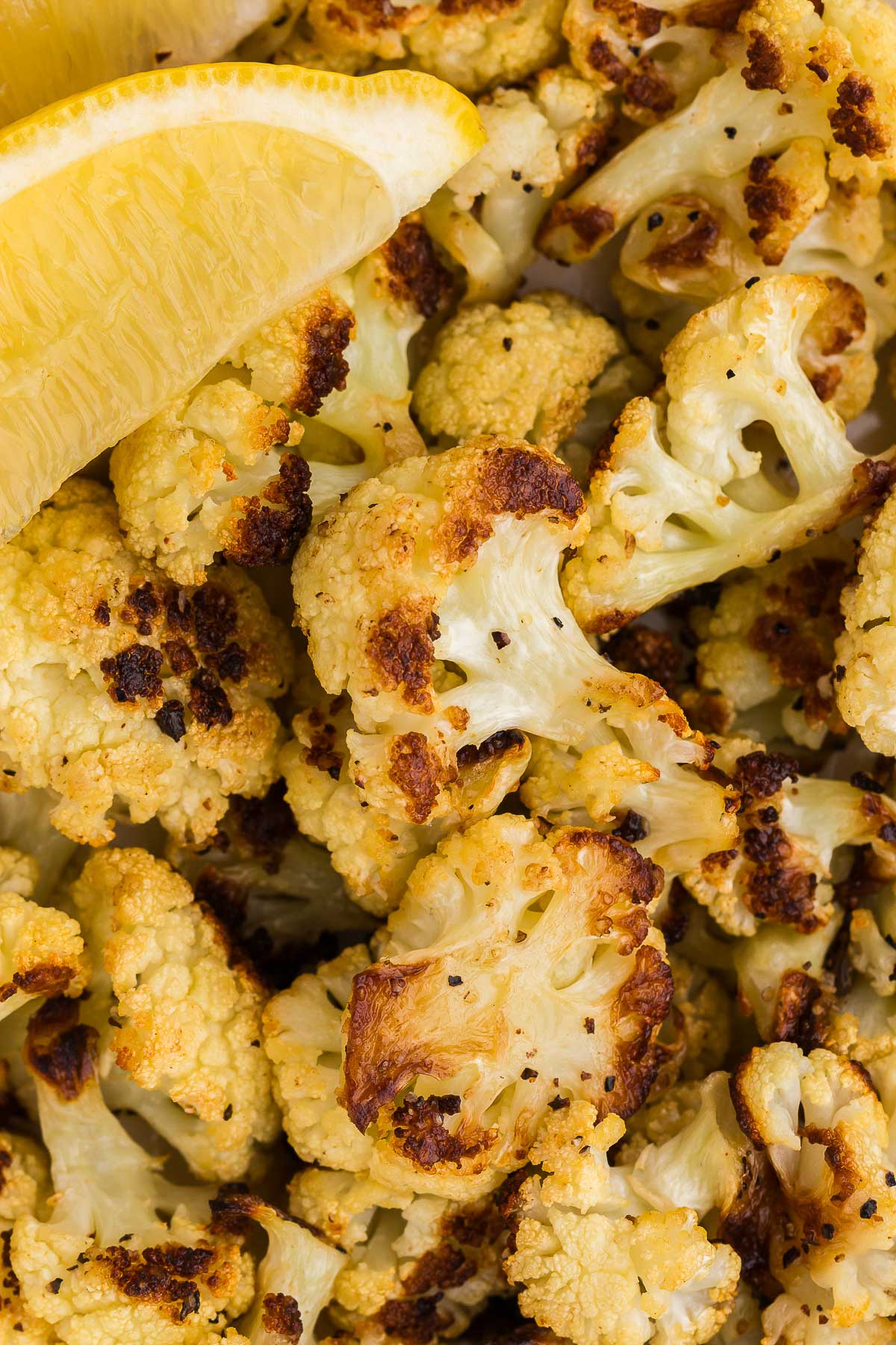 Roasted Cauliflower with a lemon wedge