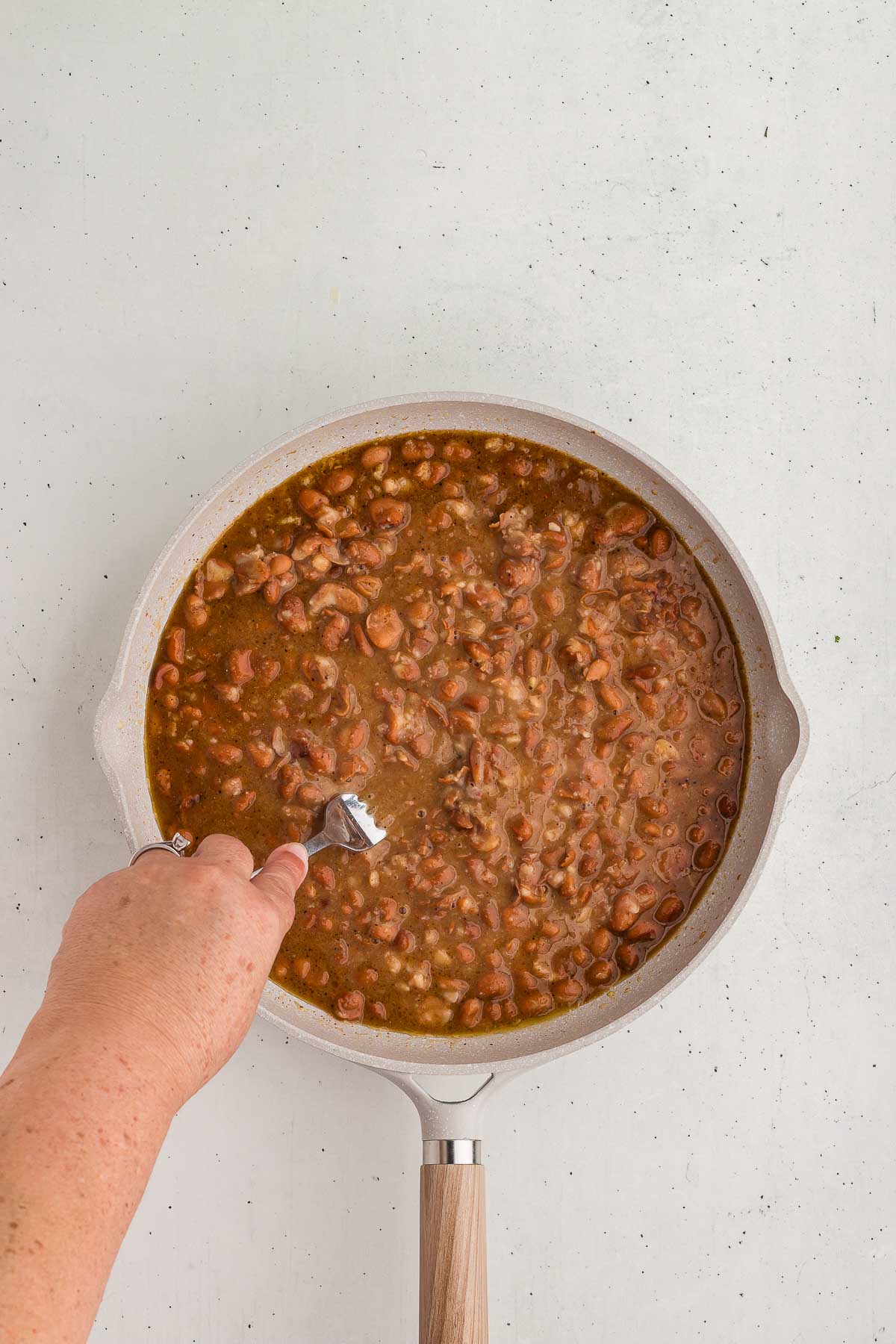 Mashing Homemade Refried Beans