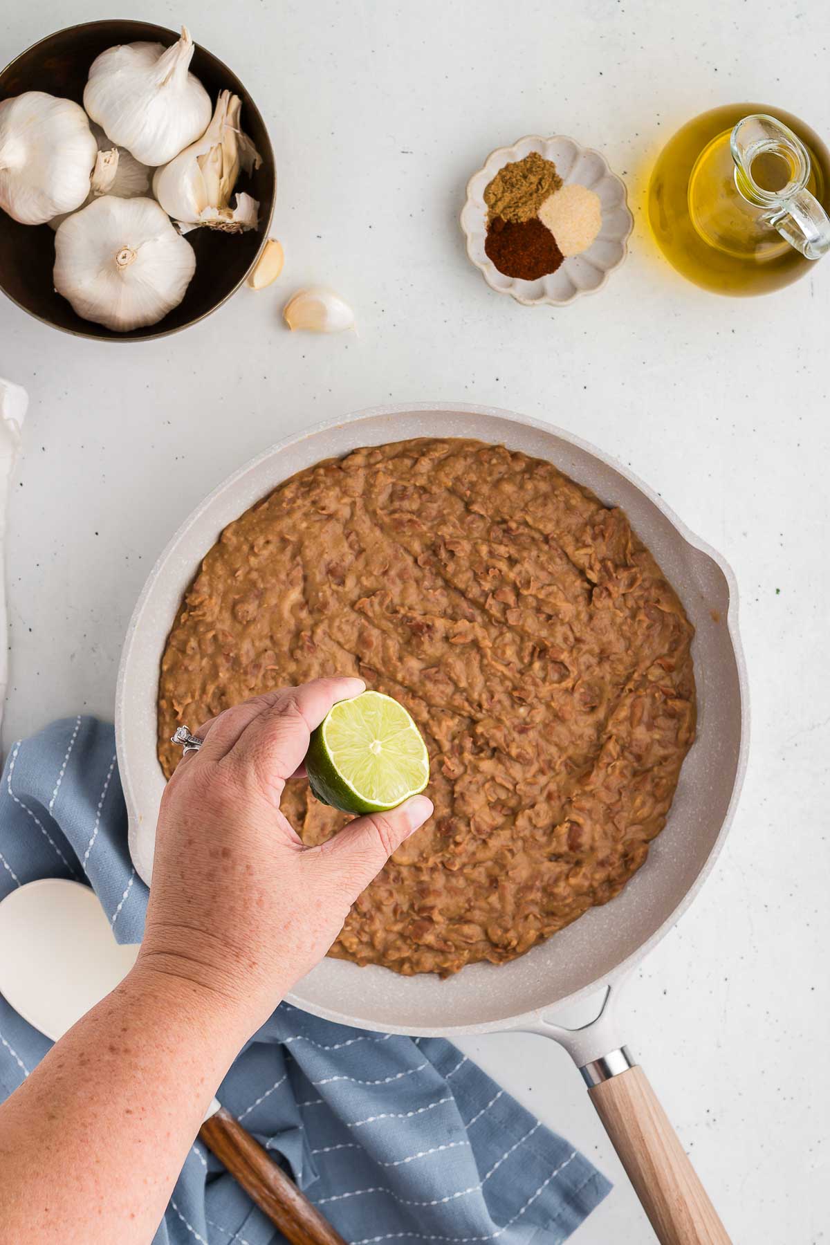 Squeeze of fresh lime juice in Homemade Refried Beans