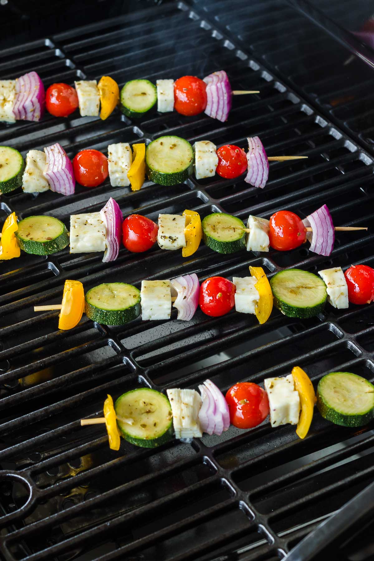 Grilling halloumi and vegetable skewers