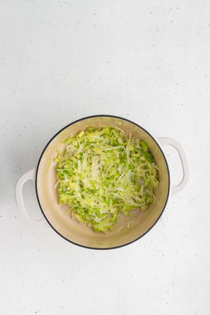 sautéing leeks for potato leek soup - leeks have just bene added to the pan