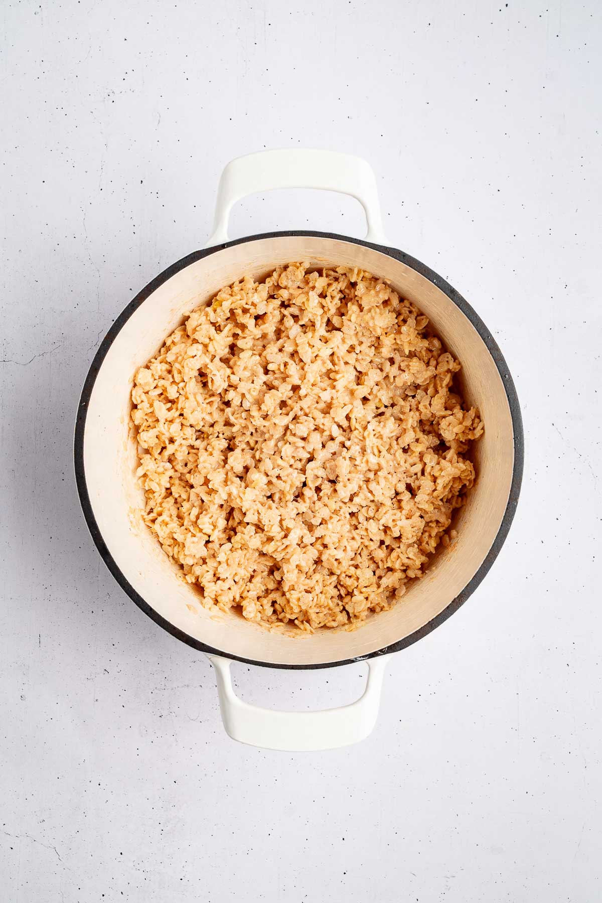 adding Rice Krispies for Brown Butter Rice Vanilla Krispie Treats